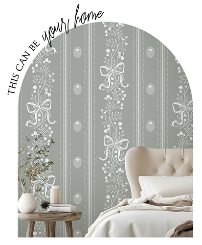 Elegant trailing floral wallpaper in sage green and cream, featuring bows, set in a preppy grandmillennial bedroom with a plush bed and natural light
